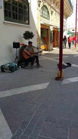 Street Art. Hidden Talent. Very nice guitar player on the streets of Malta