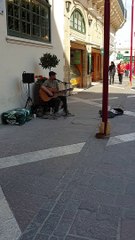 Street Art. Hidden Talent. Very nice guitar player on the streets of Malta