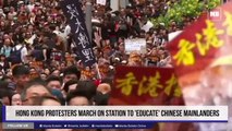 Hong Kong protesters march on station to 'educate' Chinese mainlanders