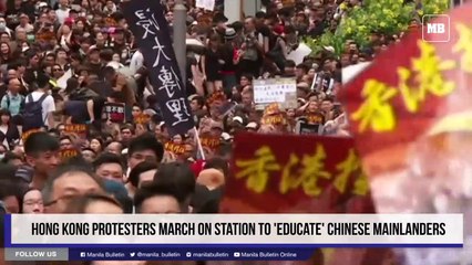 Download Video: Hong Kong protesters march on station to 'educate' Chinese mainlanders