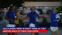 Victorious USA players arrive back at hotel