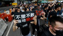 Thousands march in Hong Kong to draw mainland Chinese attention