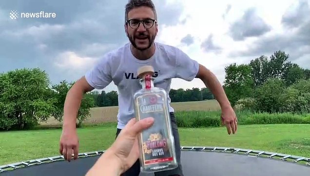 Funny moment YouTuber face plants after performing his own take on the bottle cap challenge