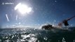 Agile great white shark eclipses the sun during incredible slow-mo leap