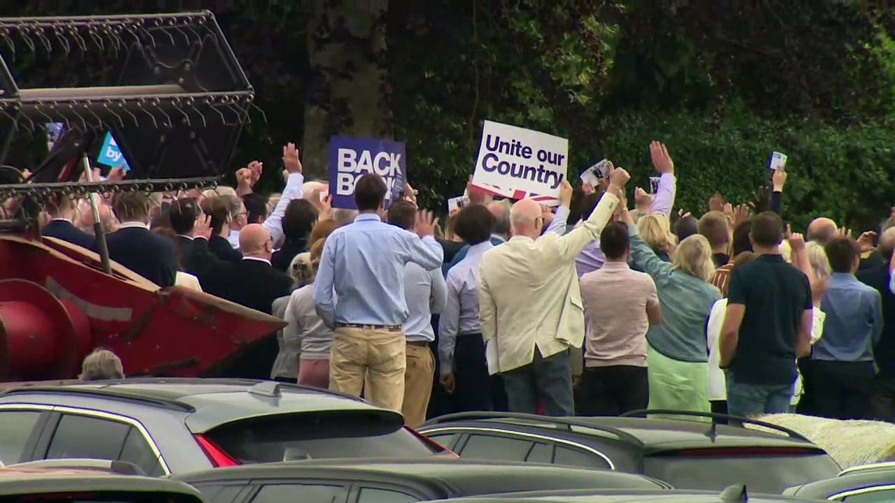 Boris Johnson climbs into combine harvester on campaign trai