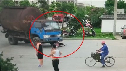 Chinese woman caught on video in apparent attempt to scam truck driver by making it look like he hit her