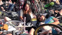 Hundreds of cyclists stage a 'die-in' protest at New York park