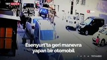 Geri gelen aracın altında kalmaktan son anda kurtuldular