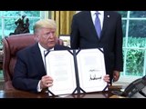 Trump signs humanitarian aid package for migrants