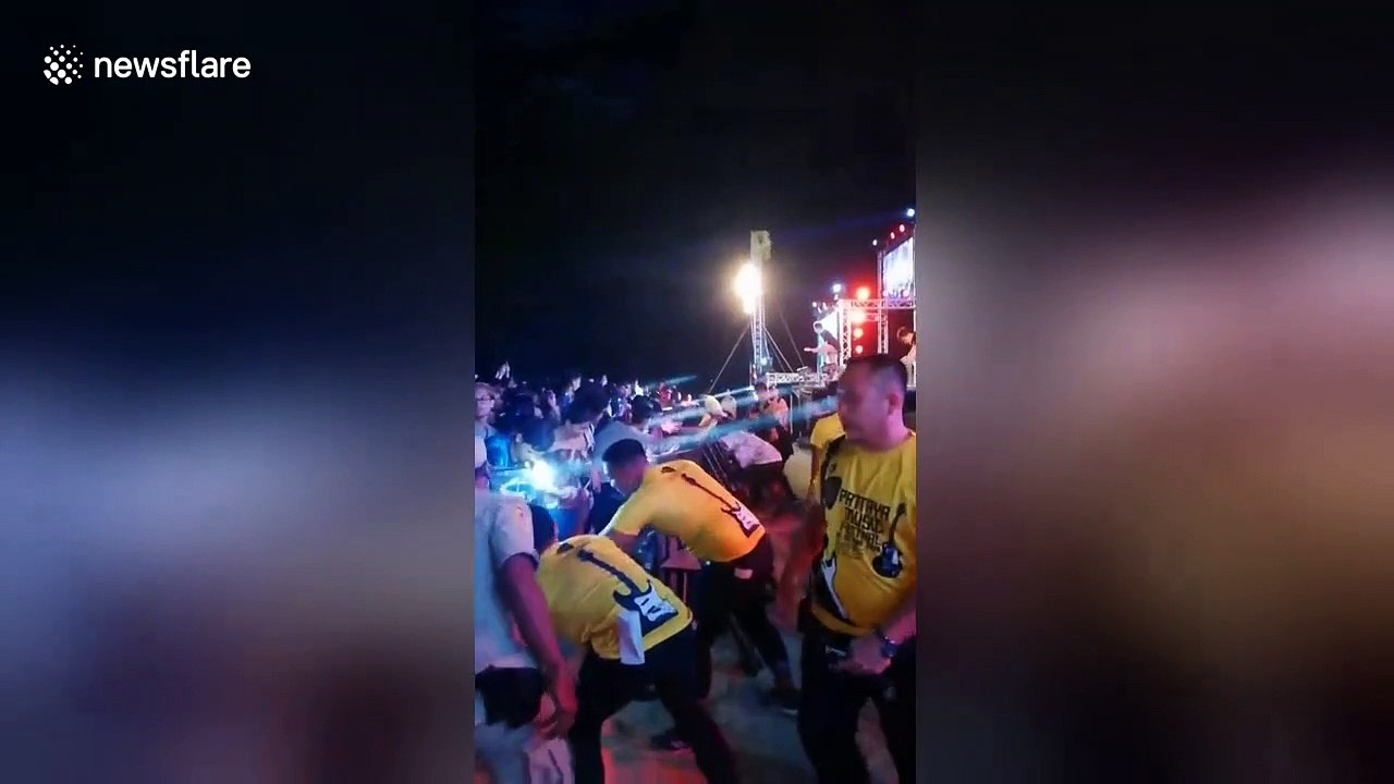 Audience goes wild for Thai rock singer who goes crowd surfing