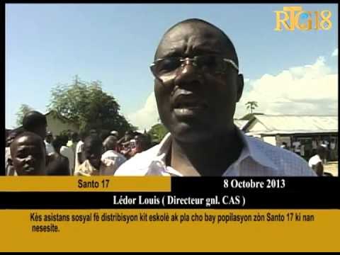 Kès asistans sosyal fè distribisyon kit eskolè ak pla cho bay popilasyon zòn Santo 17 ki nan nesesit