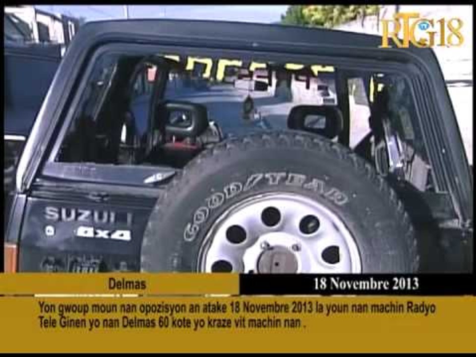 Yon gwoup moun nan opozisyon an atake 18 Novembre 2013 la youn nan machin Radyo Tele Ginen yo