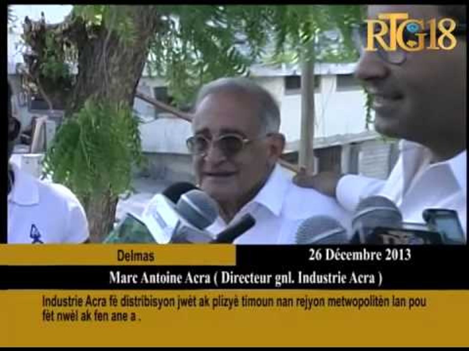 Industrie Acra fè distribisyon jwèt ak plizyè timoun  nan rejyon metwopolitèn lan pou fèt Nwèl ak fe