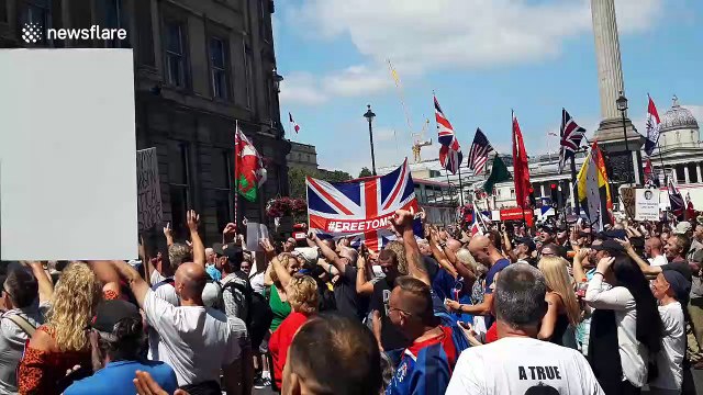 Tommy Robinson supporters gather near Trafalgar Square in support of the former EDL leader