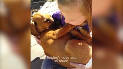 Girl Sings Adorable Lullaby to a Rescue Dog