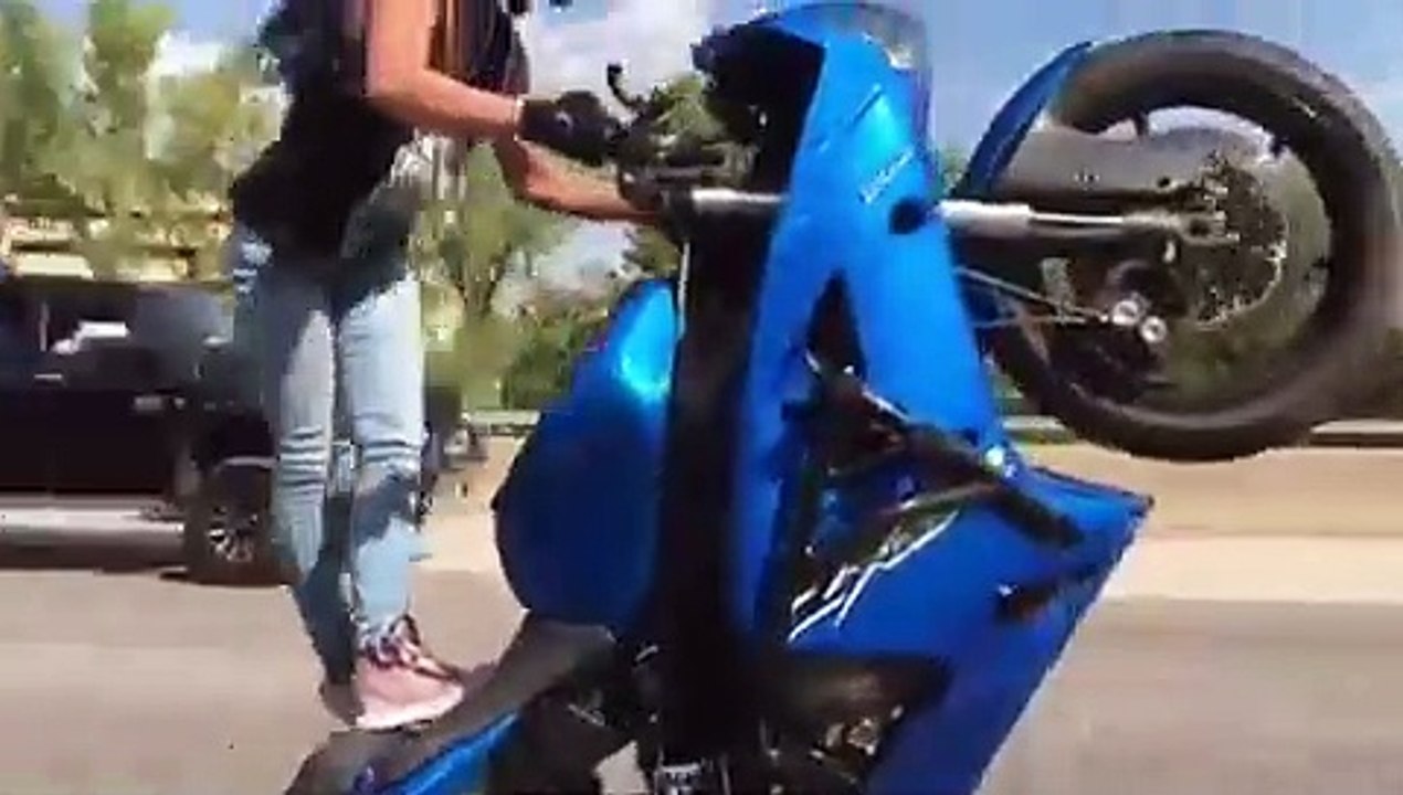 Girl is doing wheelie - wow this girl is incred...