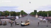 Jet-powered flyboard steals show at Bastille Day military parade
