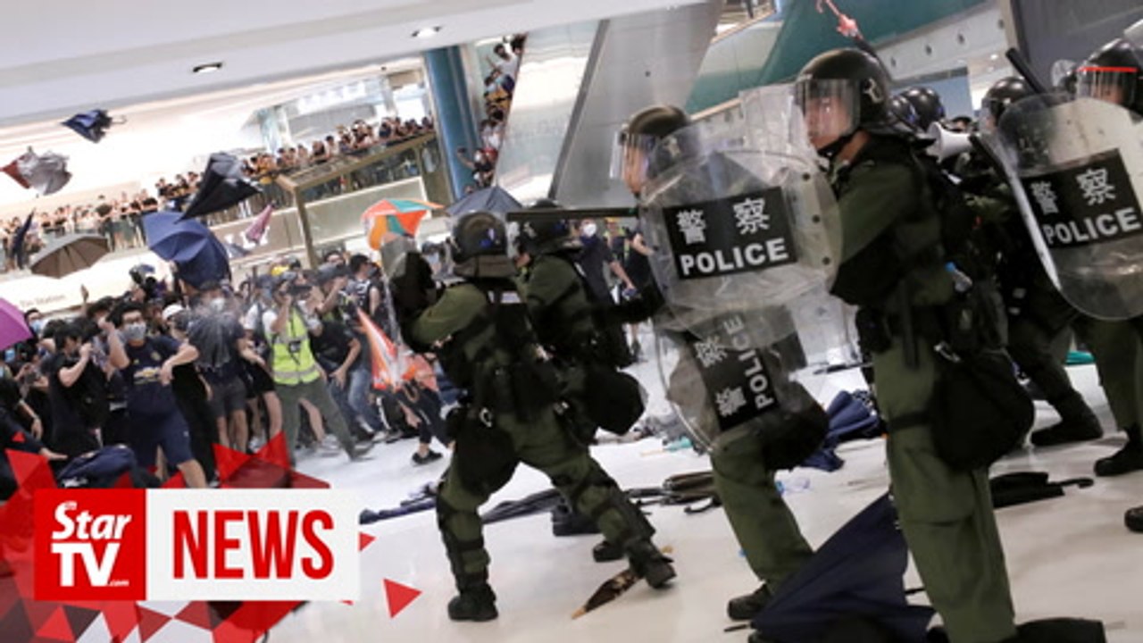 Hong Kong anti-extradition protesters fire up fight in the suburbs