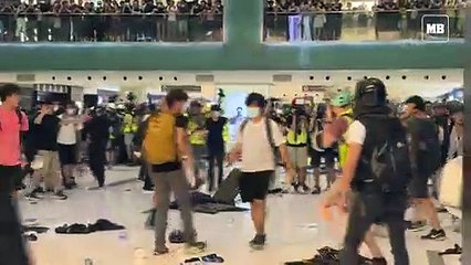 Hong Kong protesters and police clash inside mall