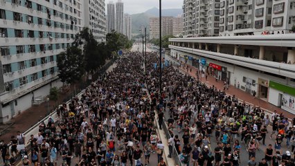 Thousands back on Hong Kong streets to keep up pressure