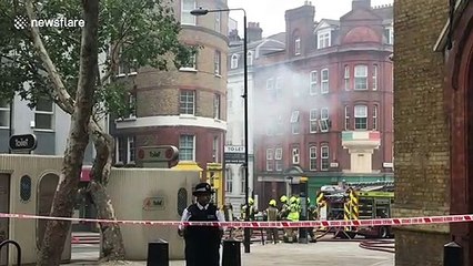 Firefighters battle blaze at shop in central London