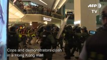 Police, protesters clash inside mall in latest Hong Kong anti-extradition march