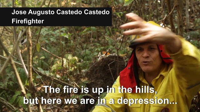 Firefighters combat wildfires still active in the Bolivian rainforest