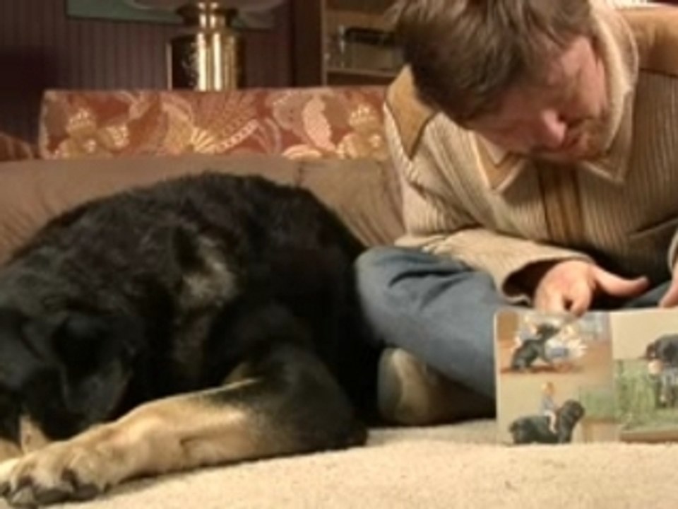 Reading with Carl the Rottweiler