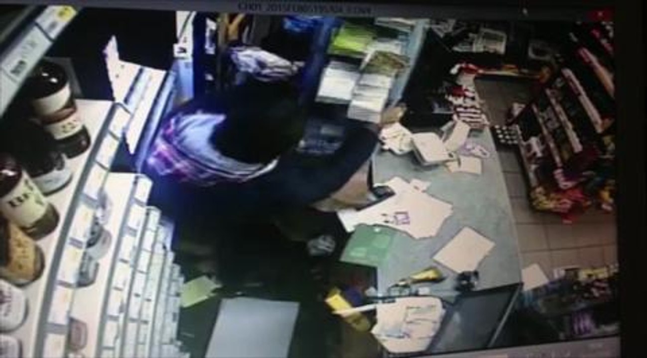 Robber fought off