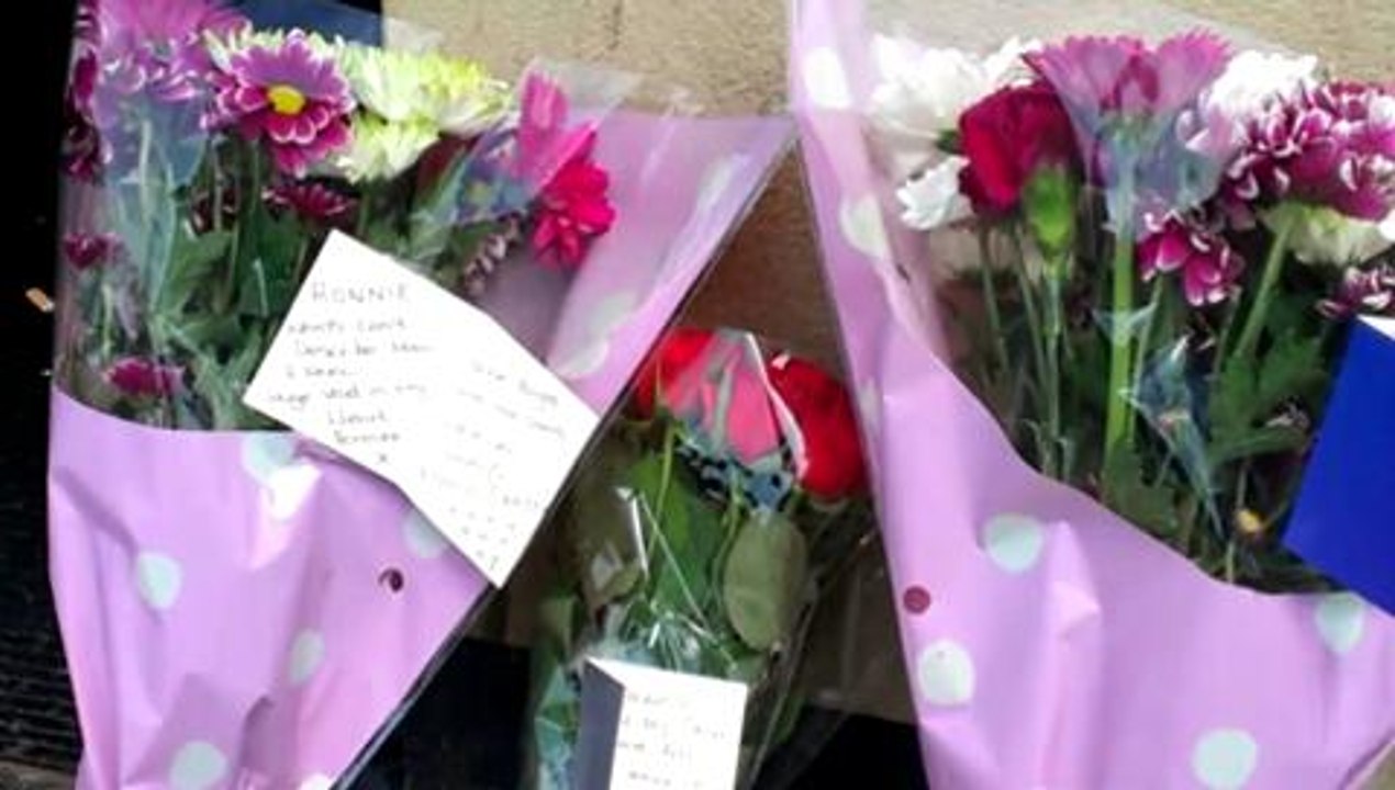 VIDEO: floral tributes at scene as five arrested on suspicion of murder