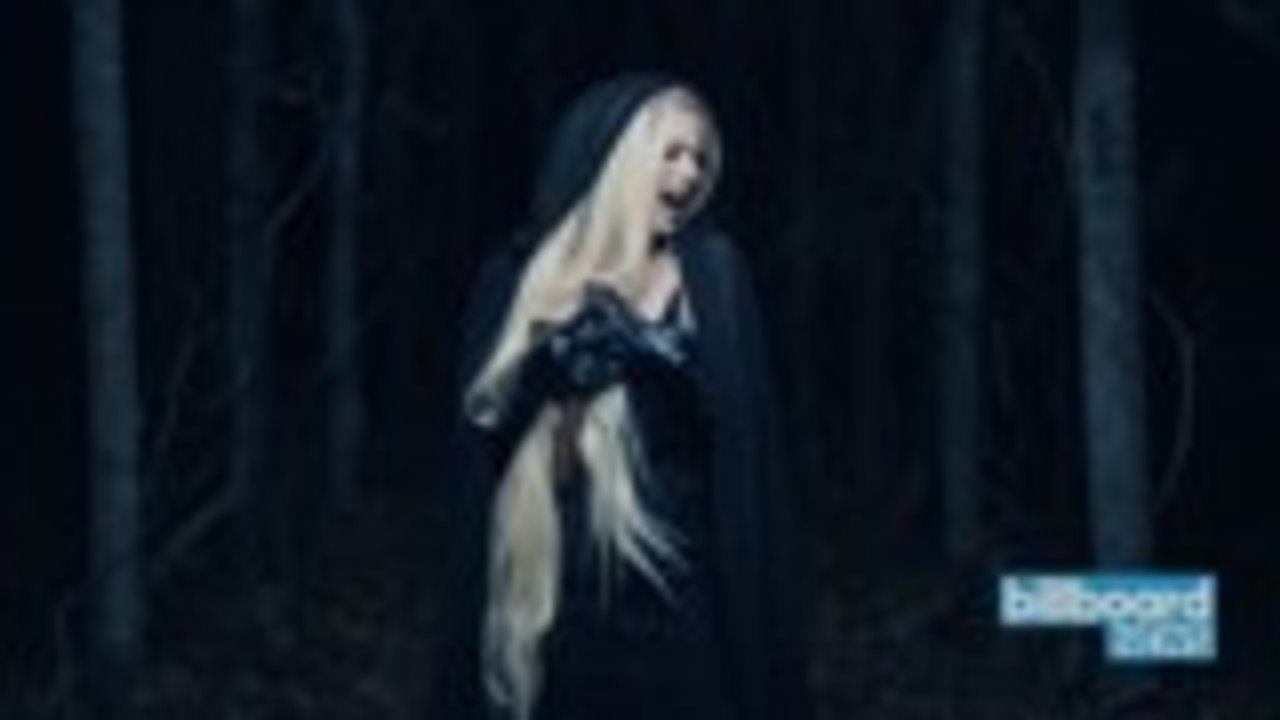 Avril Lavigne Shares Music Video For "I Fell in Love With the Devil" | Billboard News