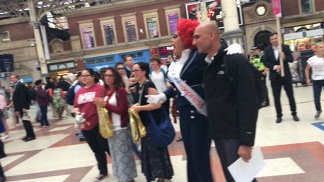 Travellers join drag queen for singalong