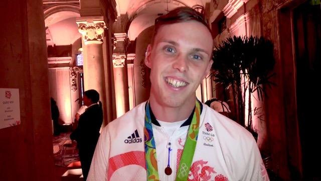 Olympic champ Joe Clarke sleeping with his gold medal