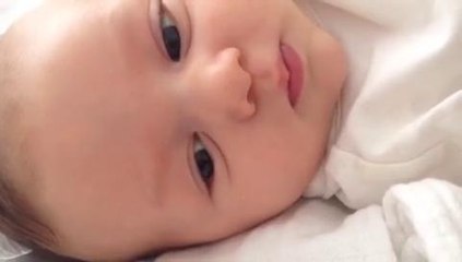 Baby says hello at 7 weeks