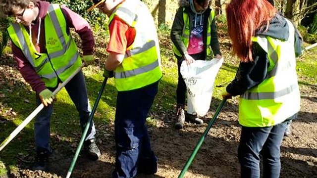 Youngsters cleaning up cemetery