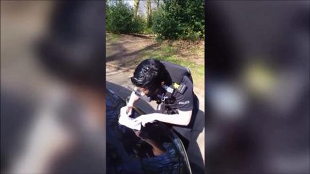 Cop stops girls picking flowers