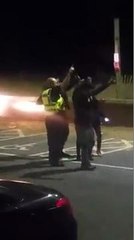 Police officers dancing