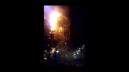 Firefighters rescue people from London tower block fire