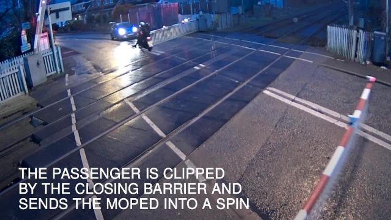 Riders knocked off moped while speeding through level crossing
