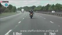 Wheelie stupid: The man stands up on the bike
