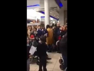 Johnny & Courteney  give Derry school choir thumbs up