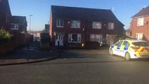 Police at murder scene in Wigan