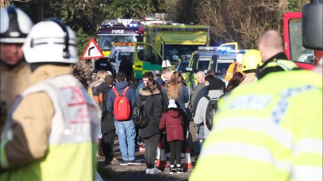 Emergency services at the scene after fatal collision at Barns Green level crossing