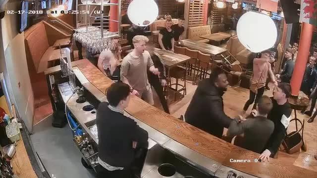 CCTV shows mass brawl in bar as glasses and cha...