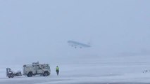 LBA plane takes off in snow