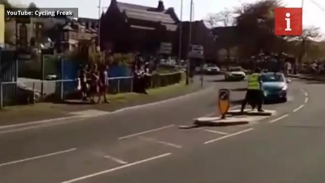 Near miss for Tour de Yorkshire marshal as support car crashes