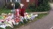 Flower tributes on Drayton Walk where 17-year-old Louis Ryan Menezes was stabbed to death