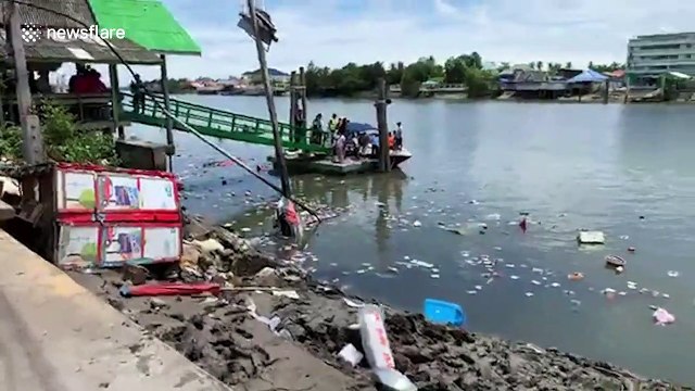 Rescuers search for survivors after temple collapses into river in Thailand