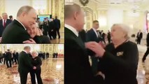 Putin hugs teacher, spends time with her despite busy schedule
