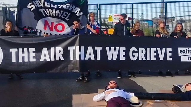 Extinction Rebellion protesters blocking entrance to concrete plant